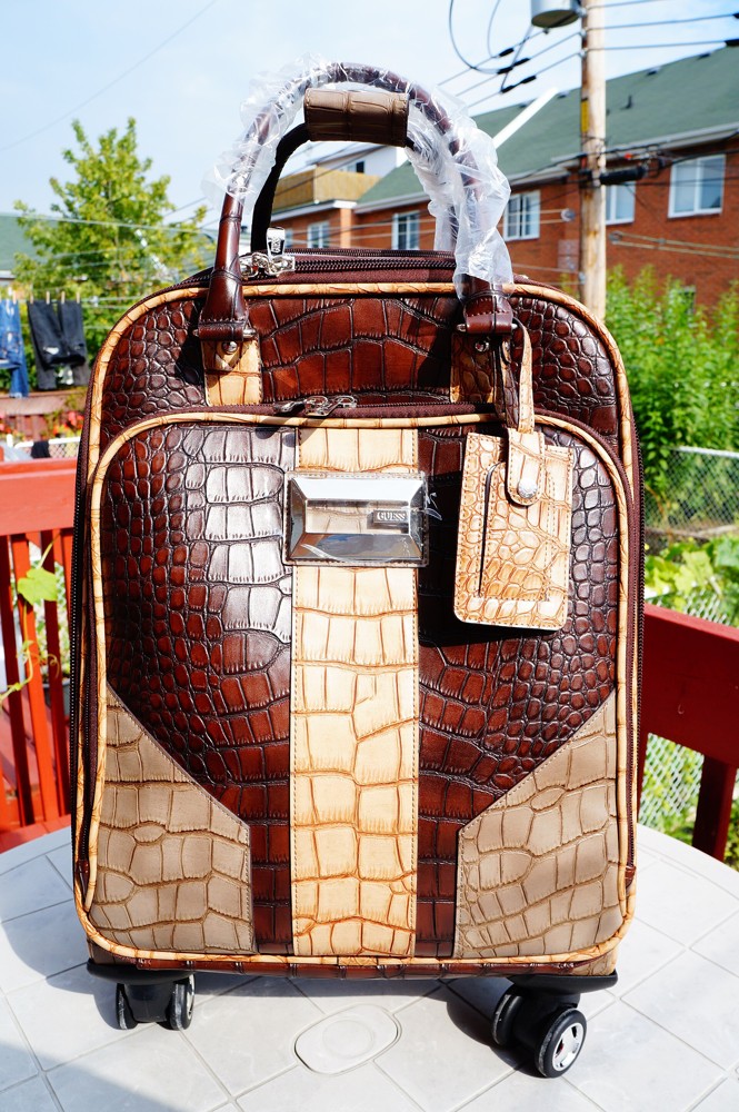 Travel suitcase photographed outdoors