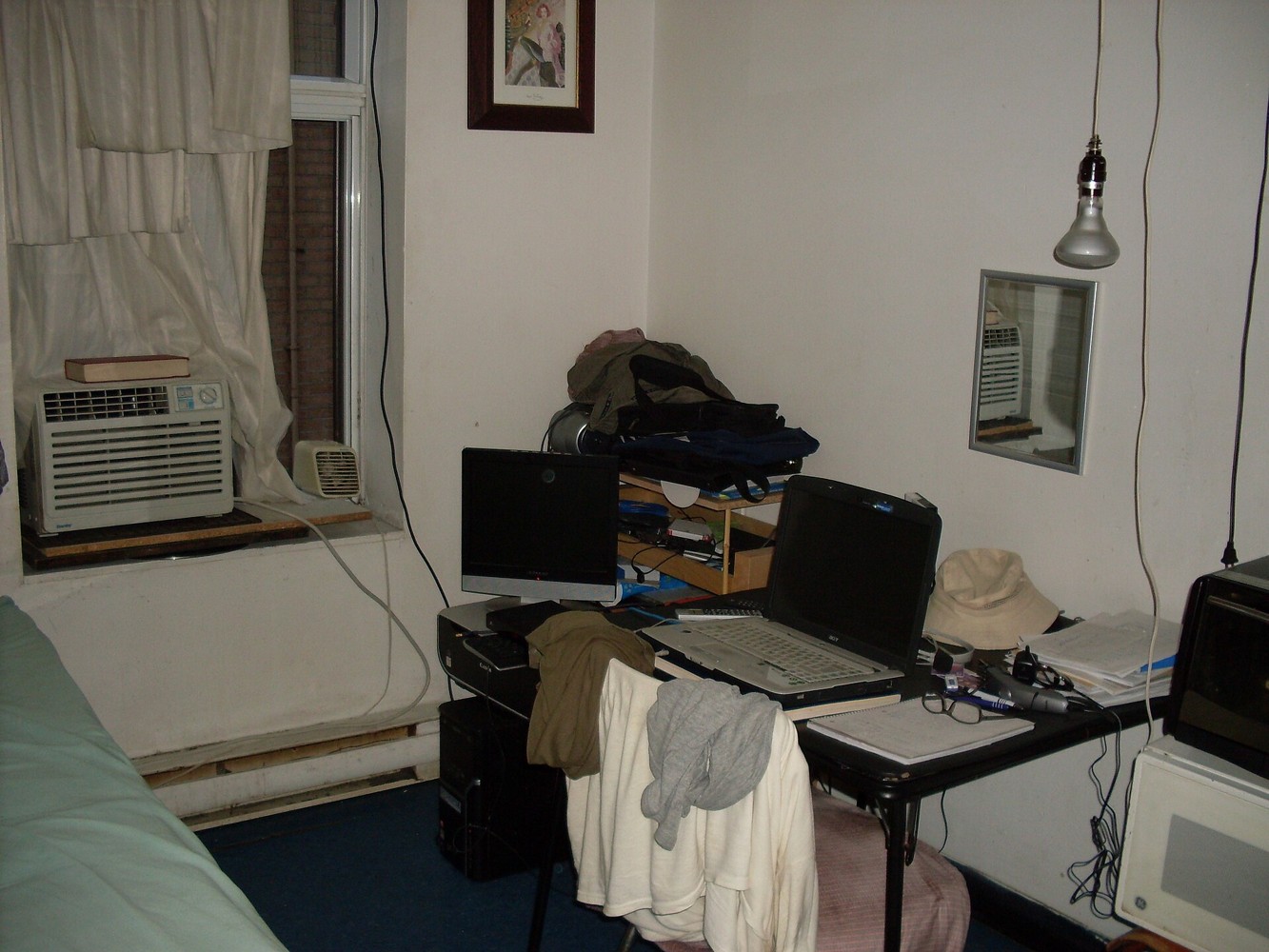 Real photograph of a compact home office workspace